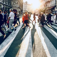 People crossing street in Vienna.